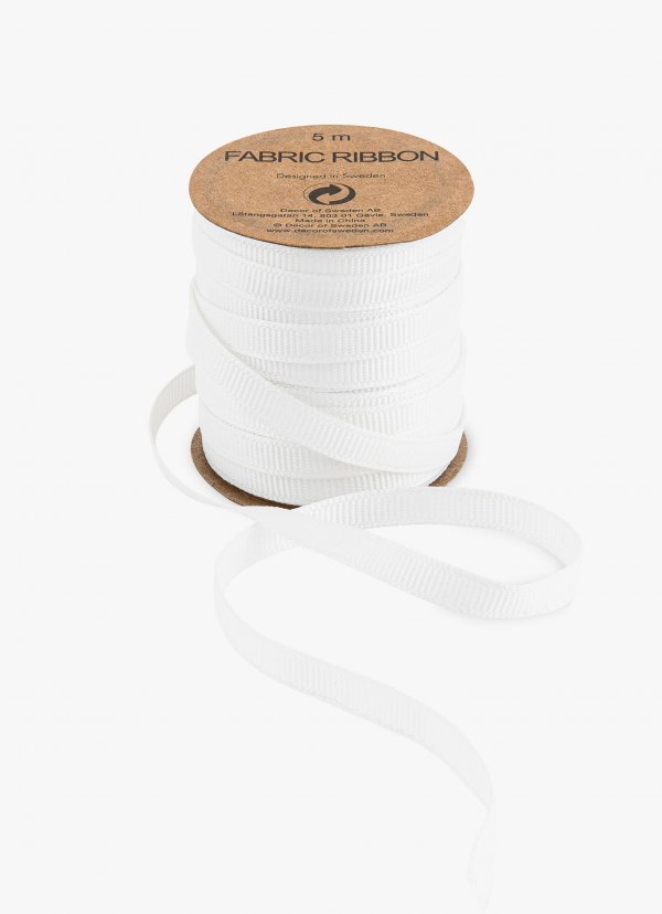 Pakkepael poolil "Valge riidest"